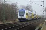 Metronom Nach Cuxhaven mit Steuerwagen voraus mit der BR 246 006-1 am Ende dran am 01.03.2012 in Horneburg Kreis Stade.